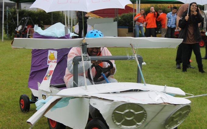 Image of a wacky races vehicle that looks like a plane with wings