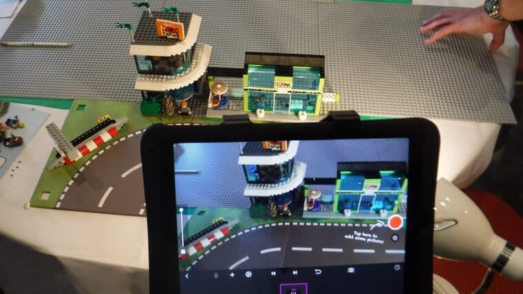 Team filming a movie using LEGO and an iPad.